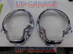 Suzuki genuine
Headlight garnish