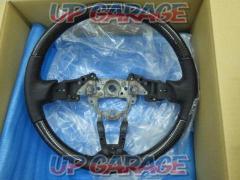 Unknown Manufacturer
leather x carbon steering